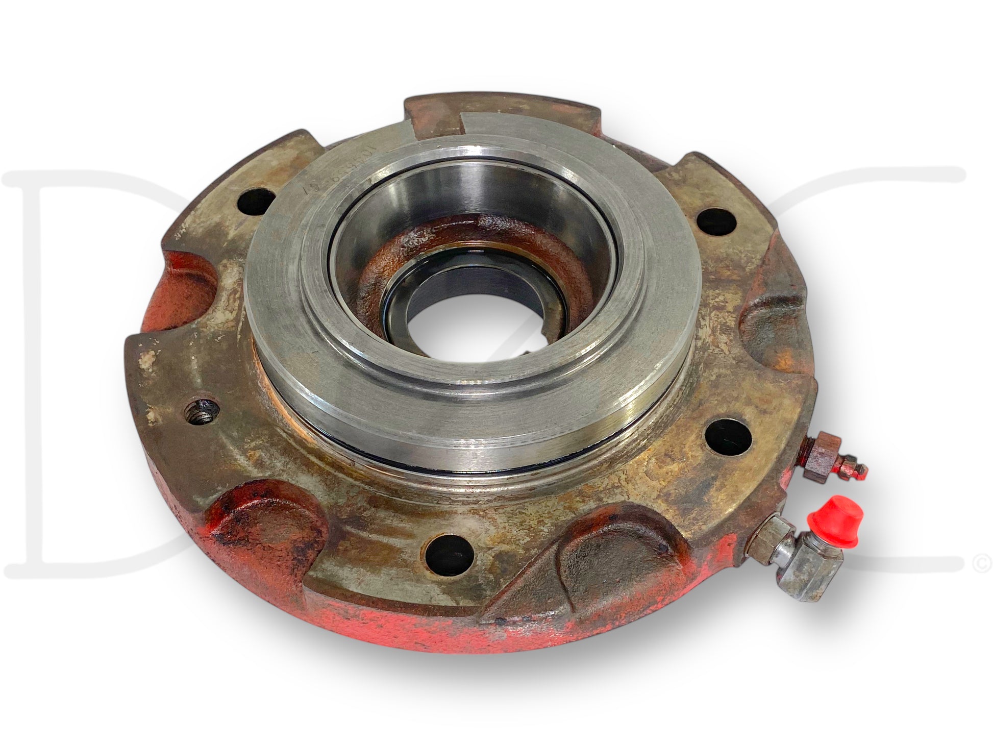 1976 International IH 1086 Tractor Brake Housing W/ Piston 104658C91 used with light wear, showing metal and rusted surfaces, including hydraulic fitting on side.