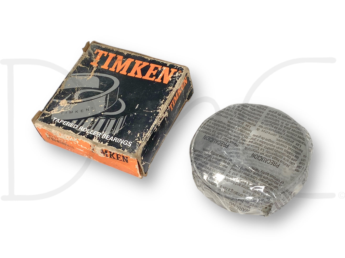 Timken Jm207010 Tapered Roller Bearing Cone Cup Race Nos in original packaging with visible wear on the box, packaged in protective wrapping for shipment.