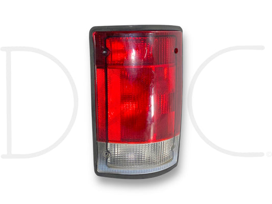97-05 Ford E250 E350 Excursion RH Right Passenger Taillight Tail Light OEM, used condition with light wear and small scratches, compatible with 1997-2005 Ford Excursion and E-Series vans.