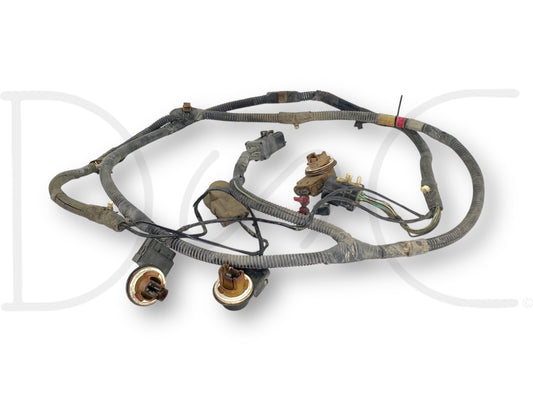 04-05 Ford Excursion Rear Taillight Tail Light Wiring Harness 4C7T-13A409-P260G used wiring harness with light wear and T-tap wires near reverse light bulb socket for 2004-2005 Ford Excursion.
