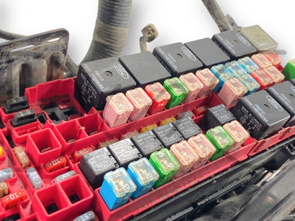 08-10 Ford F250 F350 6.4 Front Body Engine Bay Wiring Harness 8C3T-12A581-P260F showing detailed view of fuses and relays in the engine bay fuse box, used condition with light wear, compatible with 2008 to 2010 Ford Super Duty diesel trucks.