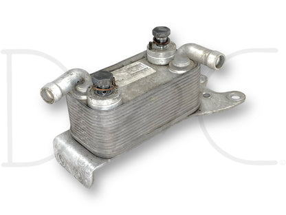 08-10 Ford F250 F350 6.4 6.4L Diesel Fuel Cooler OE 1875678C2 , 1875109C93 used fuel cooler with light wear, designed for 2008-2010 Ford Super Duty trucks, ensuring efficient cooling and compatibility with 6.4L Powerstroke diesel engines.