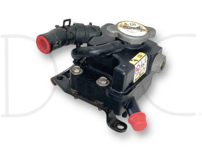 08-10 Ford F250 F350 6.4 6.4L Diesel Fuel Cooler Coolant Reservoir Tank OE used part in good condition with light wear, featuring hoses and mounting points, compatible with Ford Super Duty diesel trucks from 2008 to 2010.