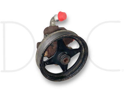 08-10 Ford F250 F350 6.4 6.4L Diesel Power Steering Pump W/ Pulley OE showing used condition with light wear, featuring the pulley wheel, metal housing, and a capped inlet, compatible with 2008-2010 Ford F-250, F-350, F-450, and F-550 Super Duty models.