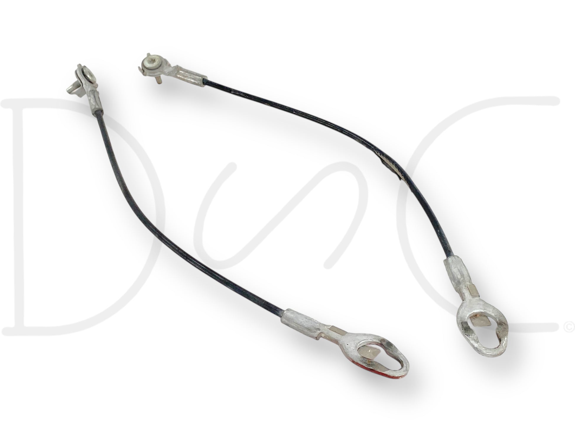08-16 Ford F250 F350 Super Duty Tailgate Cable Set OEM Support Straps Cables shown with visible wear and tear on cable sheathing, designed for Ford F-250 and F-350 trucks from 2008 to 2016, featuring durable metal ends and OEM quality for reliable tailgate support.