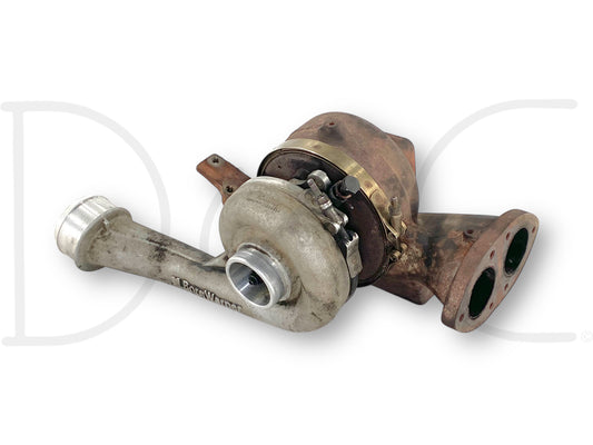 08-10 Ford F250 F350 6.4 6.4L Diesel High Pressure Turbo Turbocharger *Core* showing a used turbocharger assembly with visible wear, designed for Ford Super Duty diesel trucks 2008 to 2010, featuring a turbine housing, compressor housing, and mounting flanges.