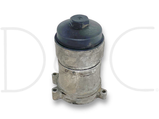 08-10 Ford F250 F350 6.4 6.4L Diesel Oil Filter Housing OE used part in good condition with light wear, removed from 2008 Ford F-250 King Ranch 6.4L Diesel, compatible with 2008-2010 Ford F-250 and F-350 trucks.
