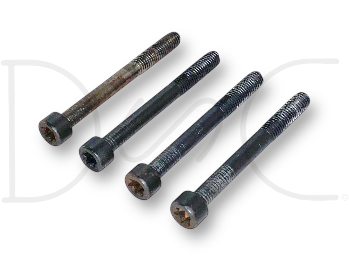 08-10 Ford F250 F350 6.4 6.4L Diesel Oil Filter Housing Bolts OE Bolt Set Torx shown as four used bolts with light wear, compatible with 2008-2010 Ford F-250 and F-350 diesel trucks, designed for secure installation and durability in OE applications.