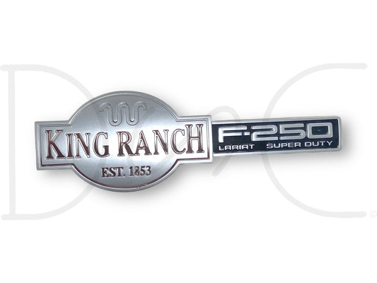03-07 F250 F-250 King Ranch Lariat Super Duty Fender Badge Emblem Plate LH Left with light wear, fading, and scratches from a 2004 Ford F-250 King Ranch 6.0L Diesel.