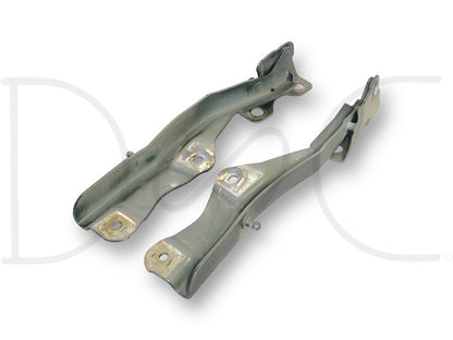 99-07 Ford F250 F350 Super Duty Hood Hinge Set Green Hood Hinges OE RH LH Pair used with light wear, compatible with Ford F-250, F-350, F-450, and F-550 trucks.