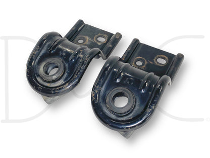 03-07 Ford F250 F350 Upper Radiator Mount Bracket Pair OE Brackets showing used, good condition black metal brackets with light wear for Super Duty truck radiator support.