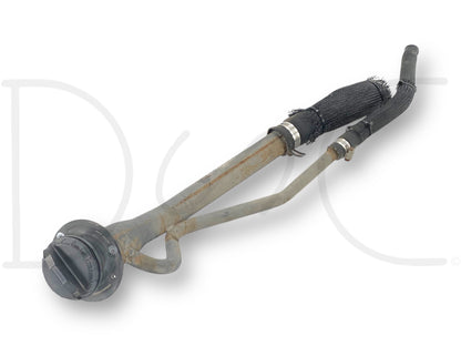 99-07 Ford F250 F350 Super Duty Diesel Fuel Filller Neck Short Bed OEM gas cap and filler neck assembly with used light wear, compatible with Ford F-250 F-350 trucks.