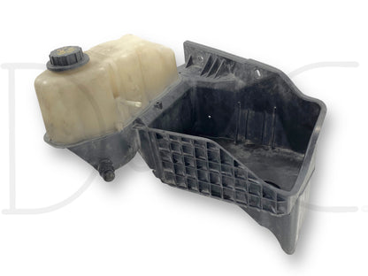 08-10 Ford F250 F350 6.4 Radiator Coolant Overflow Reservoir Tank Battery Tray in used condition with light wear, compatible with 2008-2010 Ford F-250, F-350, F-450, F-550 models, includes an off-white coolant reservoir and black battery tray made for 6.4L Powerstroke diesel trucks.