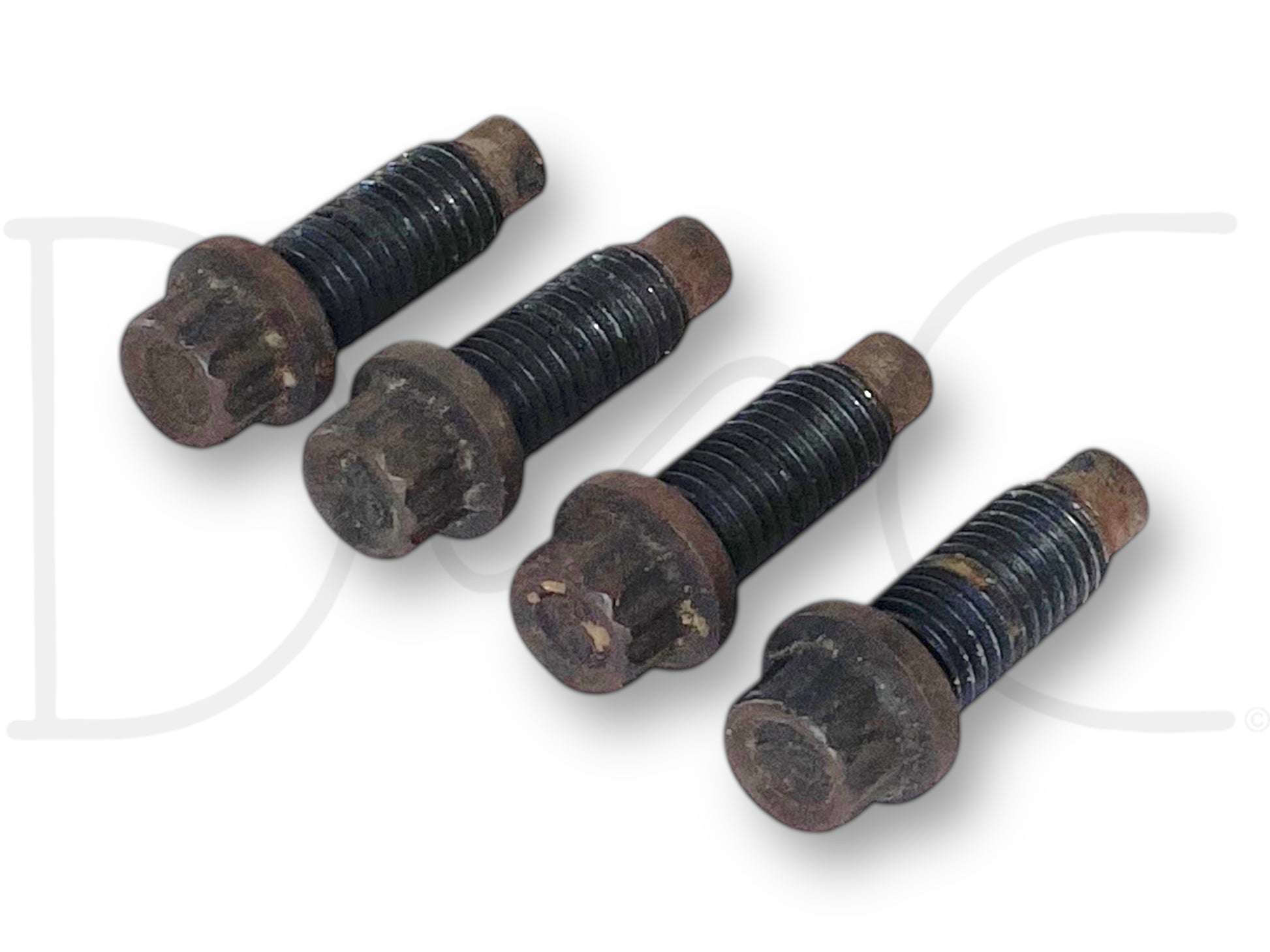99-10 Ford Super Duty F250 F350 Driveshaft To Flange Bolts OEM Bolt Set (4) shown with light wear, used condition. Four black threaded bolts with rust spots on heads and tips, designed for fitment on 1999-2010 Ford Super Duty trucks including F-250, F-350, F-450, and F-550 models.