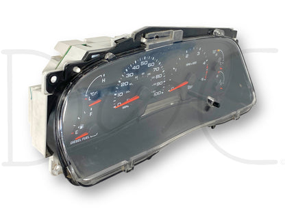 03-04 Ford F250 F350 Diesel Instrument Gauge Cluster Speedometer 4C34-10B49-He displaying speedometer, fuel gauge, and engine temperature with clear plastic cover, used condition with light wear, compatible with 2003-2004 Ford Super Duty trucks including F250 and F350 models.