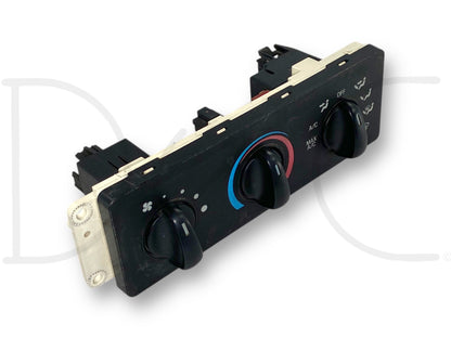 99-04 Ford F250 F350 HVAC Heater A/C Temp Climate Control Switch Panel *Blem* with three control knobs for fan speed, temperature, and airflow mode, used and tested working with cracks in back panel around illumination bulbs, compatible with 1999-2004 Ford Super Duty trucks.
