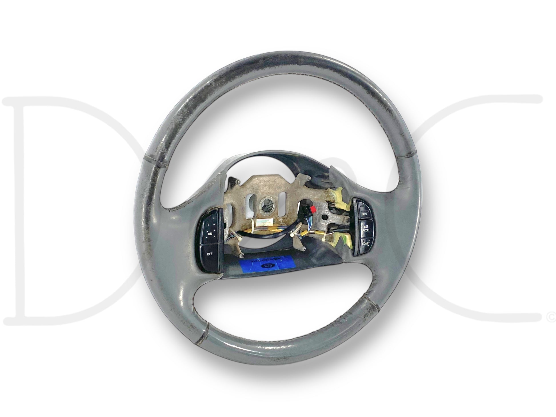 99-04 Ford F250 F350 Lariat Steering Wheel W/ Cruise Control Gray Leather OEM, used with light wear and surface finish worn around edges, compatible with 1999-2004 Ford Super Duty trucks including F250, F350, F450, and F550 models.