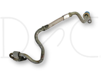 03-07 Ford F250 F350 6.0 6.0L Diesel Turbo Oil Supply Line Tube OEM 1845280C91 used condition with light wear, compatible with 2003-2007 Ford F-250, F-350, F-450, and F-550 trucks, featuring a metal braided section for durability.