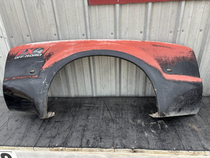 99-10 Ford F350 DRW Dually Rear Fender RH Right Passenger UD Black *Blem* with visible fading, cracks, and wear, designed for 1999-2010 Ford F-250, F-350, F-450, F-550 trucks, compatible with 6.0L Powerstroke and Super Duty models, used OE-quality part.