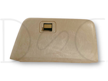 03-07 Ford F250 F350 Super Duty Tan Glove Box Storage Compartment in used good condition with light wear, compatible with 2003-2007 Ford F250, F350, F450, and F550 models, featuring a tan finish and a rectangular latch handle.