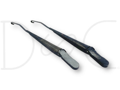 99-07 Ford F250 F350 Windshield Wiper Arm Set Pair RH Right LH Left OEM Arms in used good condition with light wear and fading, compatible with 6.0L Powerstroke and Super Duty models from 1999 to 2007, genuine OE parts for reliable work truck performance.