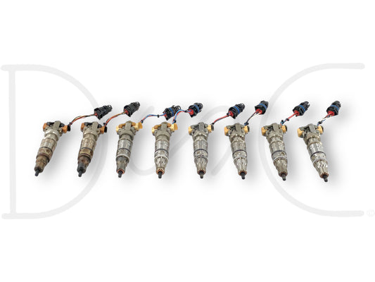 03-07 Ford F250 F350 6.0 6.0L Diesel Fuel Injector Set (8) Injectors *Cores* shown with several blemished electrical plugs, suitable for 2003-2007 Ford F-250, F-350, F-450, and F-550 Super Duty diesel trucks, offering quality pre-owned 6.0L Powerstroke engine parts.
