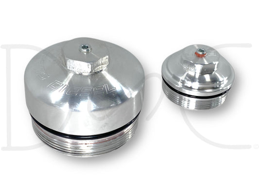 03-07 Ford F250 6.0 6.0L Beans Diesel Fuel Oil Filter Caps Lids Billet Aluminum in used good condition with light wear, made from billet aluminum, designed for 2003-2007 Ford F-250, F-350, F-450, and F-550 Super Duty diesel trucks, featuring a polished finish and durable construction.