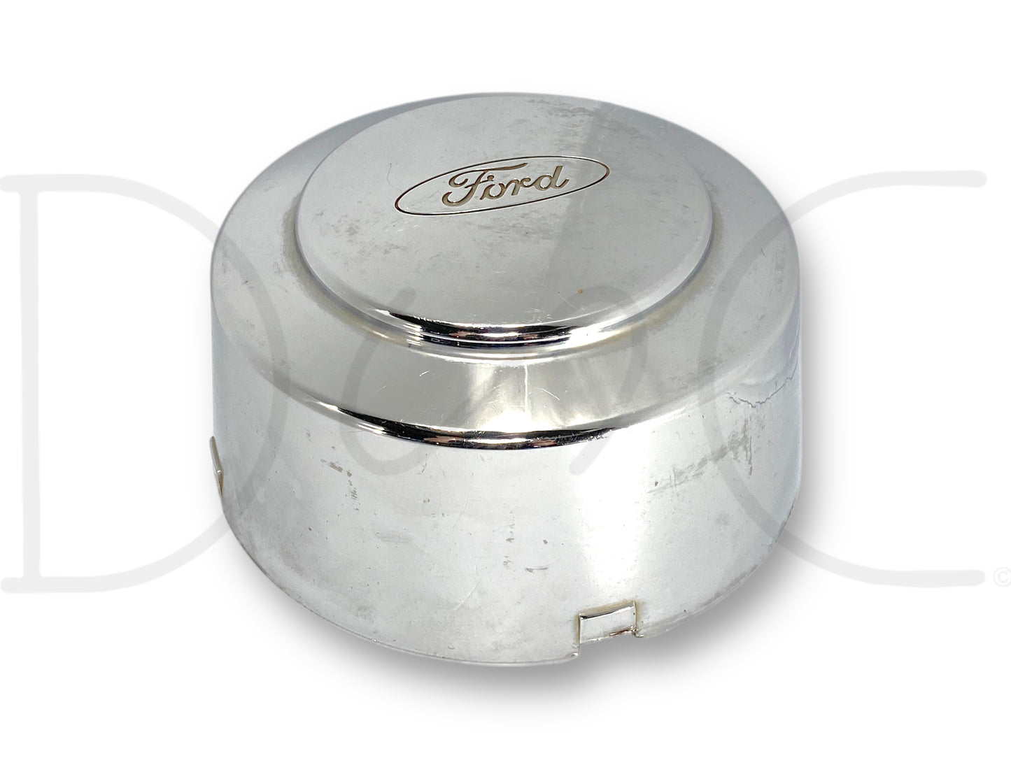 99-04 Ford F350 Super Duty Dually Rear Wheel Center Hub Cap Hubcap Chrome OEM with light wear, scratches, and surface blemishes, compatible with 1999-2004 Ford F-350 dually trucks, made of chrome material featuring the Ford logo.