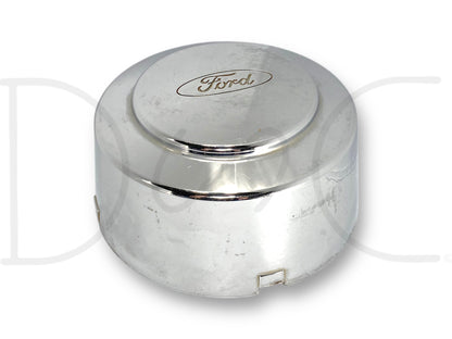 99-04 Ford F350 Super Duty Dually Rear Wheel Center Hub Cap Hubcap Chrome OEM with light wear, scratches, and surface blemishes, compatible with 1999-2004 Ford F-350 dually trucks, made of chrome material featuring the Ford logo.
