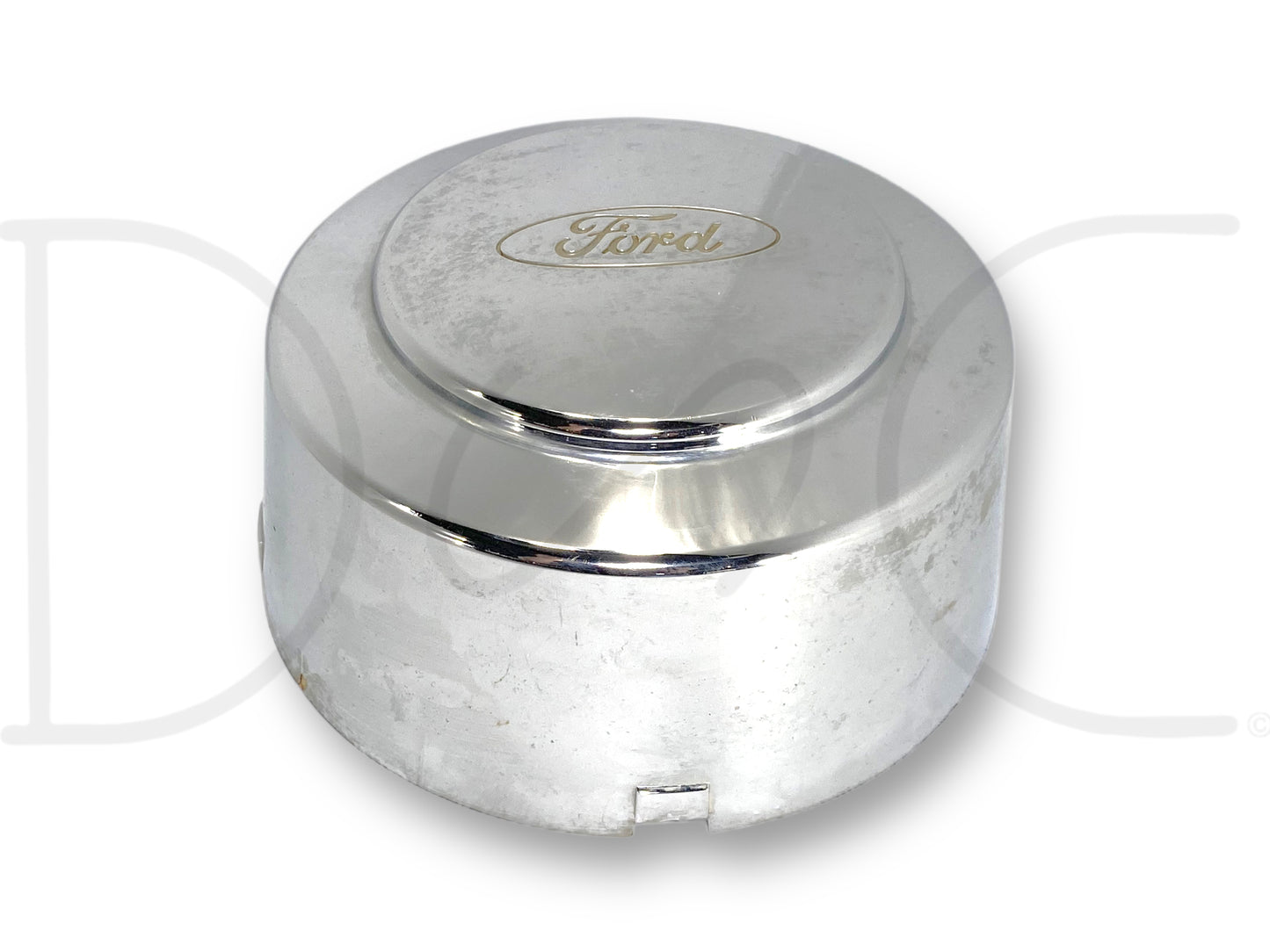 99-04 Ford F350 Super Duty Dually Rear Wheel Center Hub Cap Hubcap Chrome OEM with visible light wear, scratches, and surface blemishes, suitable for Ford Super Duty diesel models from 1999 to 2004, featuring chrome finish and Ford logo.