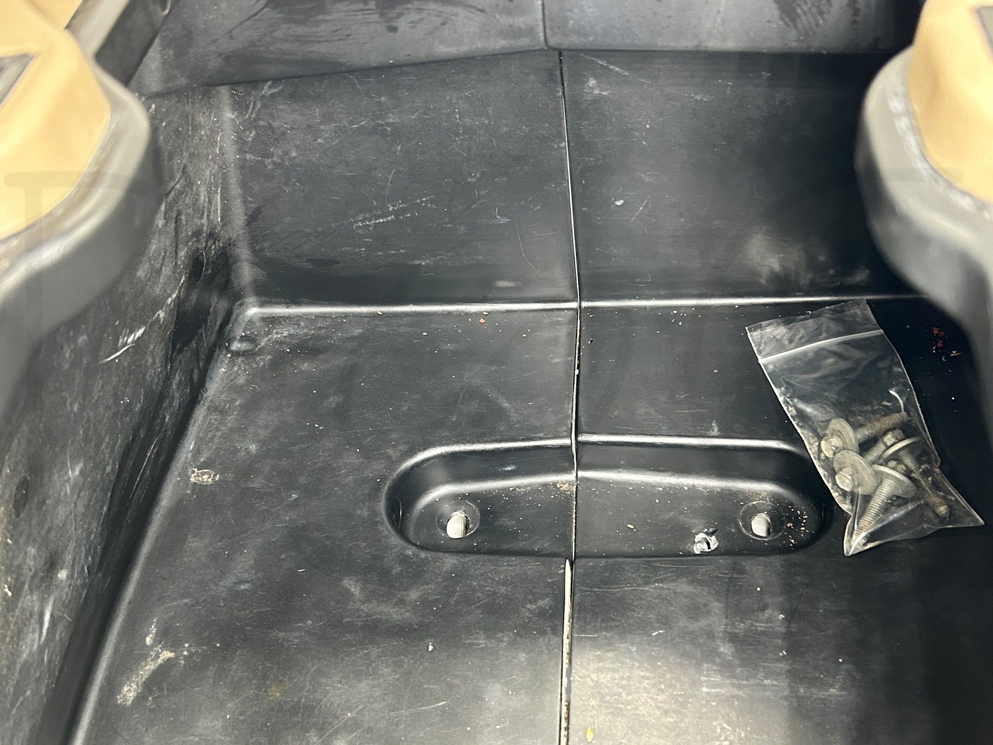 03-07 Ford F250 F350 King Ranch Center Console Floor Storage Tan Leather OE with light wear and small scratches on leather upholstery and hardware screws in plastic bag