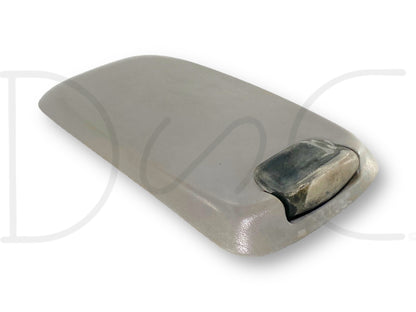 99-07 Ford F250 F350 Super Duty Center Console Floor Storage Lid Gray OE, used with light wear and fading, featuring a gray surface and black latch, compatible with Ford trucks from 1999 to 2007 including models with 7.3L diesel engines.