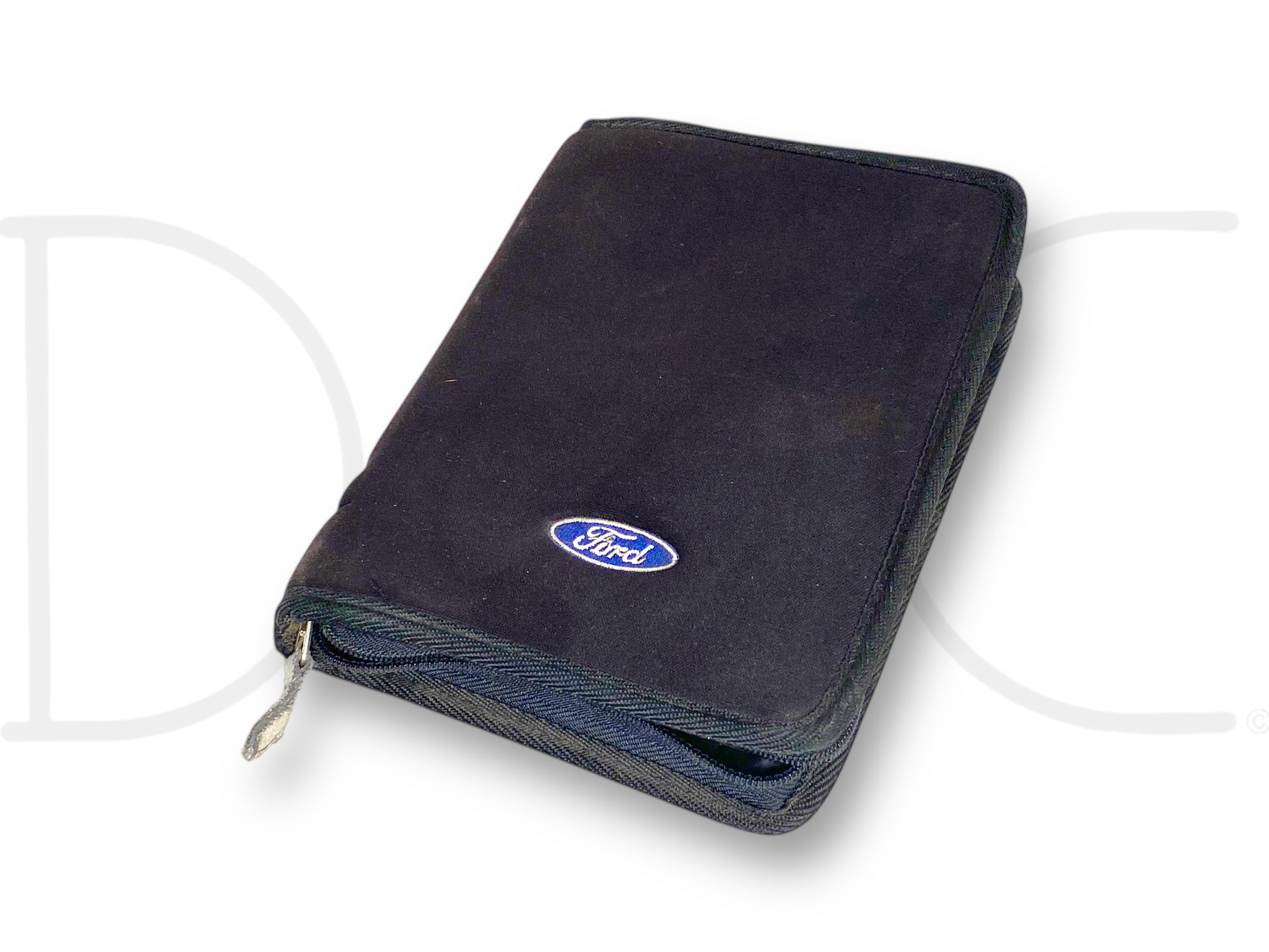 99-07 Ford F250 F350 Super Duty Owners Manual Holder Case Cover Only in used good condition with light wear, featuring a black exterior with a Ford logo, designed to fit 1999-2007 Ford F-250, F-350, F-450, and F-550 trucks.