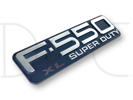 99-04 Ford F550 F-550 XL Super Duty Fender Badge Emblem Plate OEM, used with light wear, featuring silver raised lettering on a black background, designed for Ford F-550 trucks from 1999 to 2004, suitable for diesel and Super Duty applications.