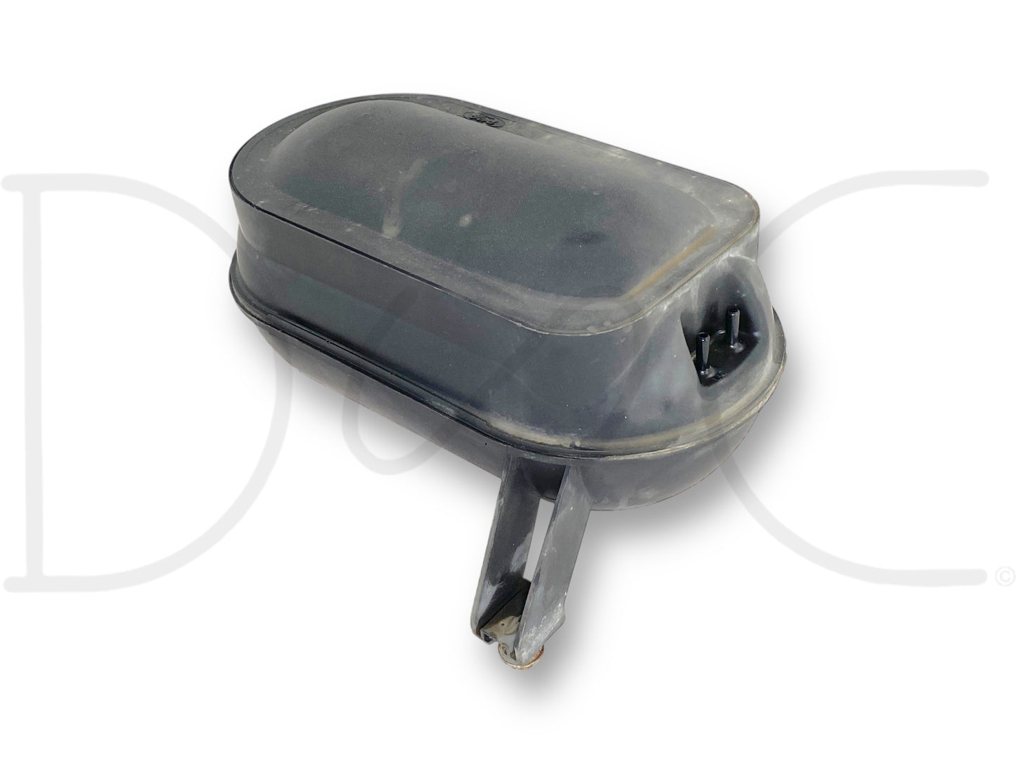 Used OE black vacuum reservoir canister tank with light wear and surface blemishes, compatible with 99-07 Ford F250 F350 trucks, labeled as 99-07 Ford F250 F350 Vacuum Reservoir Canister Tank OE F4UE-9E453-Ca.