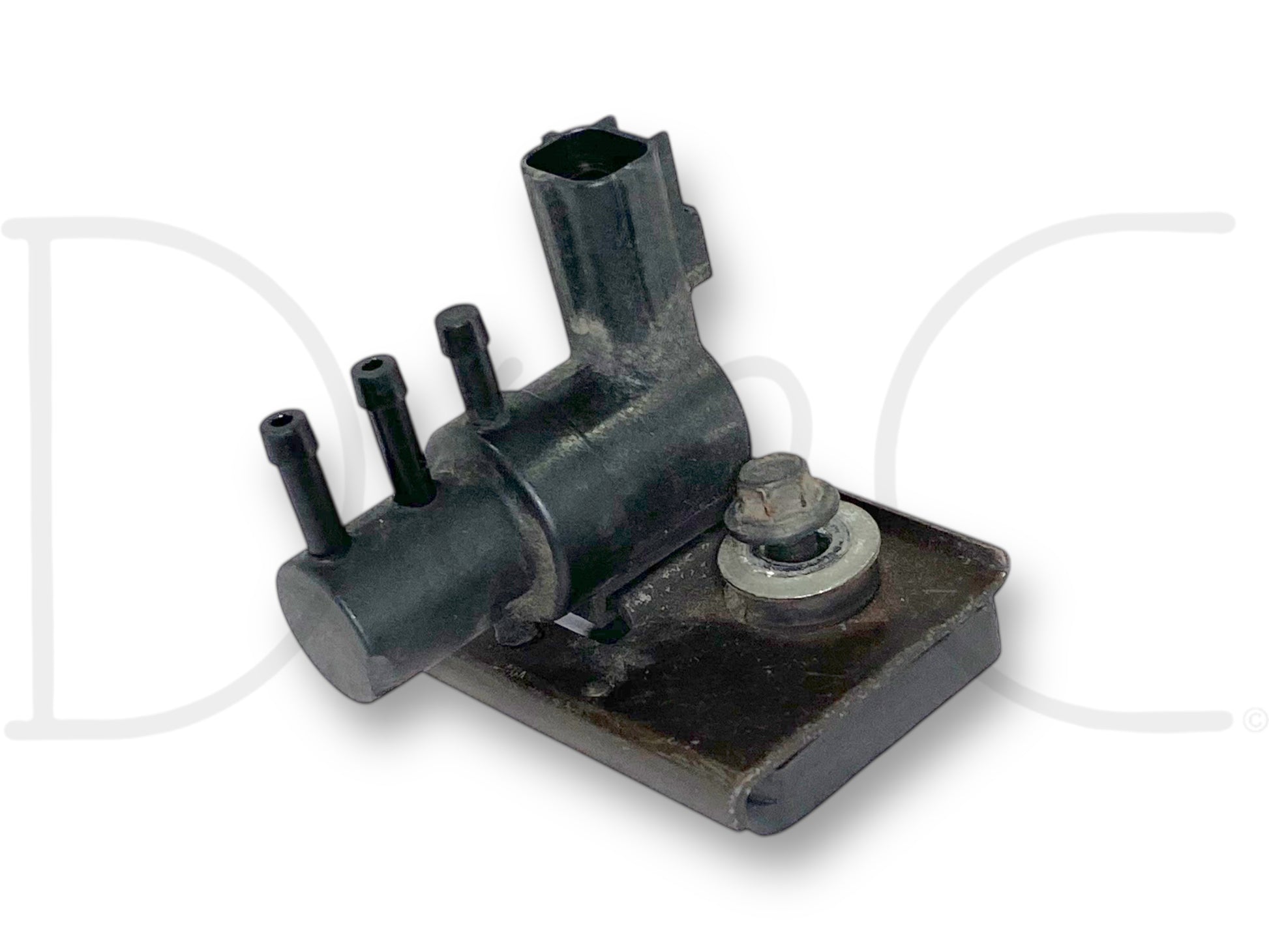 Used OE 99-02 Ford F250 F350 7.3 7.3L Diesel Turbo Boost Wastegate Solenoid with light wear, compatible with 1999-2002 F-250, F-350, F-450, and F-550 trucks, designed for turbo boost control in Ford Powerstroke diesel engines.