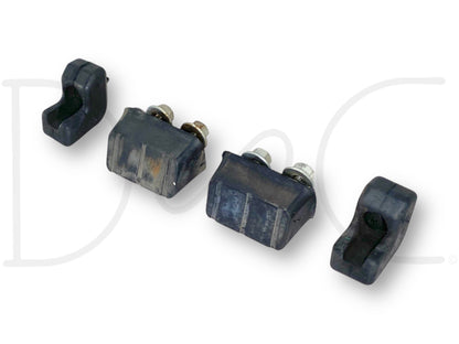 99-07 Ford F250 F350 Rear Tailgate Stop Bumper Pad Set OE Pads Bumpers shown as four black rubber bumpers, two with attached metal bolts, designed as used OE parts with light wear for 1999-2007 Ford F-250 and F-350 trucks.