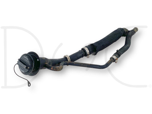 Used OE 99-07 Ford F250 F350 Super Duty Diesel Fuel Filler Neck Pipe Tube Long Bed with fuel cap, showing light wear and designed for 7.3L diesel engines, compatible with 1999-2007 Ford F-250 and F-350 trucks, featuring attached hose clamps and protective heat wrap.