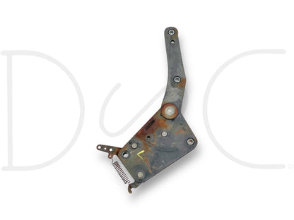 99-07 Ford F250 F350 LH Left Driver Seat Back Recline Tilt Lean Hinge Bracket OE used condition with light wear, compatible with 1999-2007 Ford F-250, F-350, F-450, F-550 trucks, featuring metal construction and visible mounting points.