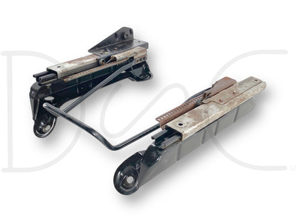 99-07 Ford F250 F350 LH Left Driver Manual Seat Track Base Frame Slider OE used part with good condition and light wear, compatible with 1999-2007 Ford F-250, F-350, F-450, and F-550 trucks, suitable for Ford Powerstroke diesel models.