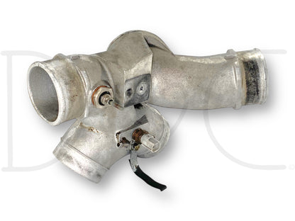 Used 99-03 Ford F250 F350 7.3 Diesel Turbo Intake Spider Manifold Plenum 1827742C1 OE, showing light wear, designed for diesel engine intake, compatible with 1999-2003 Ford F-250 F-350 trucks, made of metal with sensors and connector ports attached.