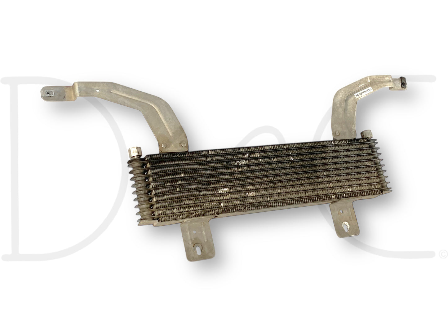 Used OEM transmission cooler with external fin design and mounting brackets, showing light wear, compatible with 99-01 Ford F250 F350 7.3 7.3L Transmission Cooler External Trans Cooler OEM for Powerstroke diesel trucks.