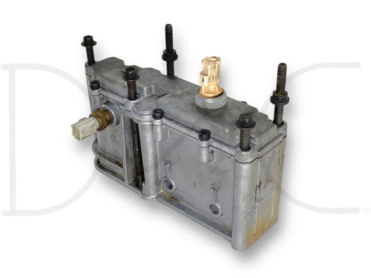 Used metal HPOP oil reservoir with light wear for diesel engine, featuring mounting bolts and connectors, compatible with 1999 to 2002 Ford truck fitments, specifically the 99-02 Ford F250 F350 Super Duty 7.3 7.3L Powerstroke HPOP Oil Reservoir OEM.