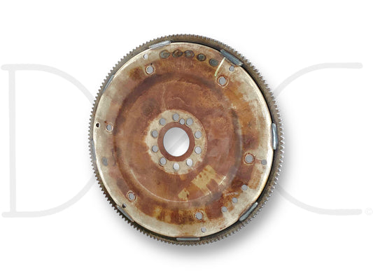 Used metal flex plate with visible light wear and surface rust, designed for 95-02 Ford F250 F350 7.3 7.3L E4OD 4R100 Auto Transmission Flex Plate Flexplate applications, suitable for Powerstroke diesel trucks including F250, F350, F450, and F550 models.