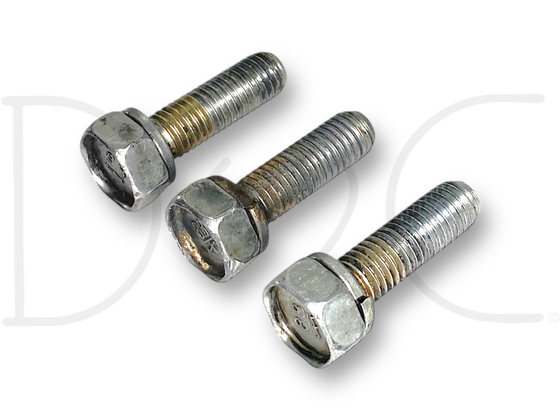 Three used metal bolts with hex heads and threaded shafts for automotive use, displayed on a white background, representing the 99-02 Ford F250 F350 7.3 7.3L Diesel Engine Starter Bolts OE Bolt Set [3] in good condition with light wear.