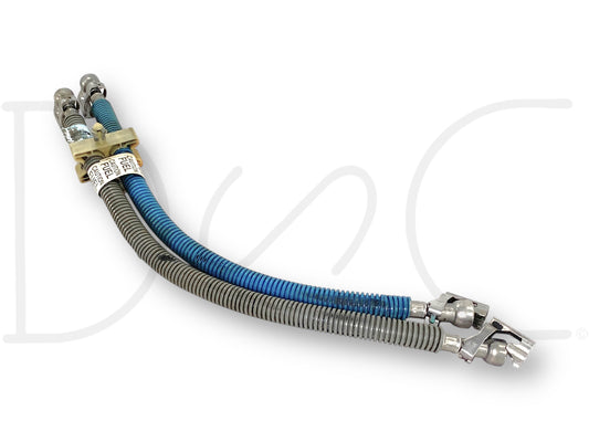 99-03 Ford F250 F350 7.3L Diesel Frame To Engine Line Set Flex Feed Return Lines used with light wear, featuring blue and gray protective corrugated sleeves and metal fittings, compatible with 1999-2002 Ford F-250, F-350, F-450, and F-550 trucks.