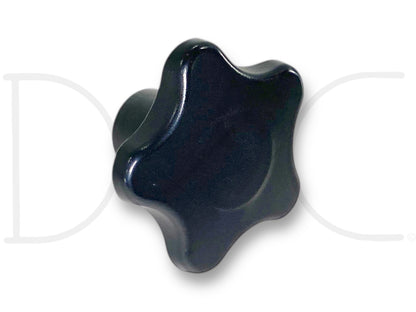 1999 Ford F250 F350 Seat Lumbar Support Adjuster Knob OEM in black plastic, used condition with light wear and small blemishes, suitable for early 1999 Ford F-250 F-350 F-450 F-550 trucks including 7.3L Powerstroke models.