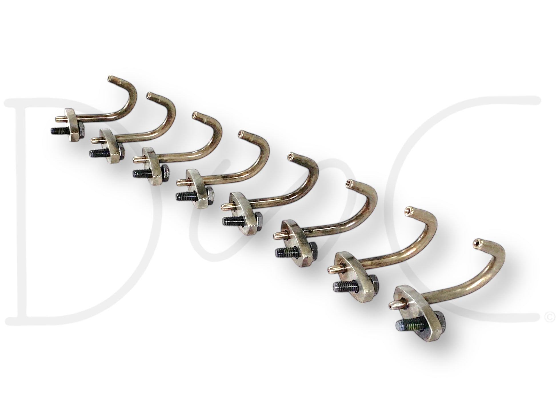 99-02 Ford 7.3 7.3L Diesel Piston Cooling Oil Jet Tube Set W/ Bolts OE Jets [8] showing eight used good condition metal oil jet tubes with bolts arranged in a line, designed for Ford 7.3L Powerstroke diesel engines, compatible with F-250 and other Super Duty trucks.