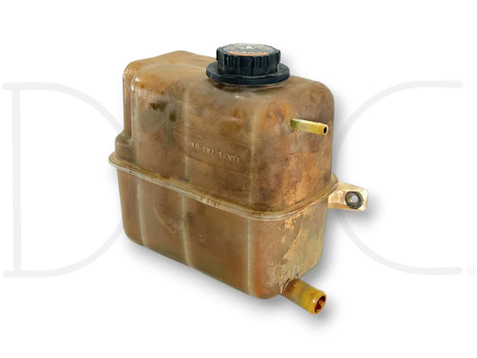 96-97 Ford F250 F350 7.3L Diesel Coolant Overflow Reservoir Bottle OEM used in good condition with light wear, compatible with 1996-1997 Ford Super Duty trucks.