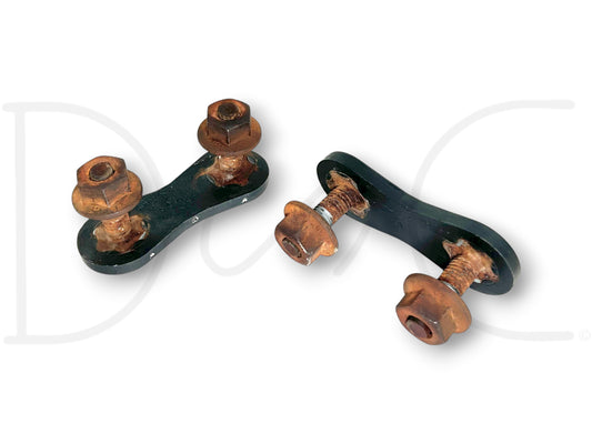 94-97 Ford F250 F350 Truck Front Bumper Bolt Set OE Bolts, used condition with light wear, includes rusted nuts and bolts attached to black metal brackets for Ford Super Duty trucks.